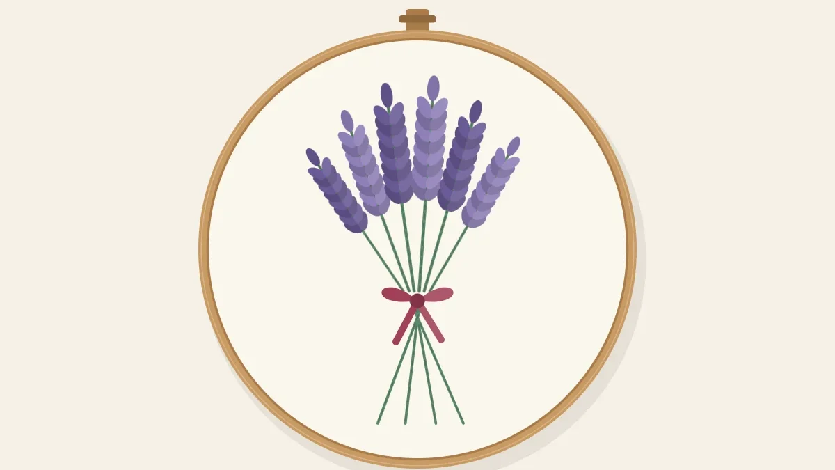 A small bundle of embroidered lavender sprigs with purple flower spikes and green stems tied with a ribbon bow, in a wooden hoop