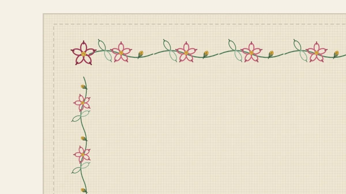 The corner of a linen napkin with a repeating border of small flowers and leaves stitched along two edges
