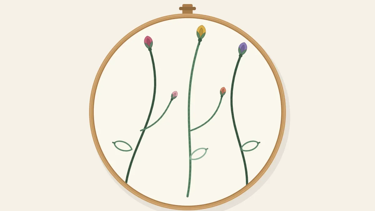 Curving stems with small leaves and buds worked in rope-like stem stitch